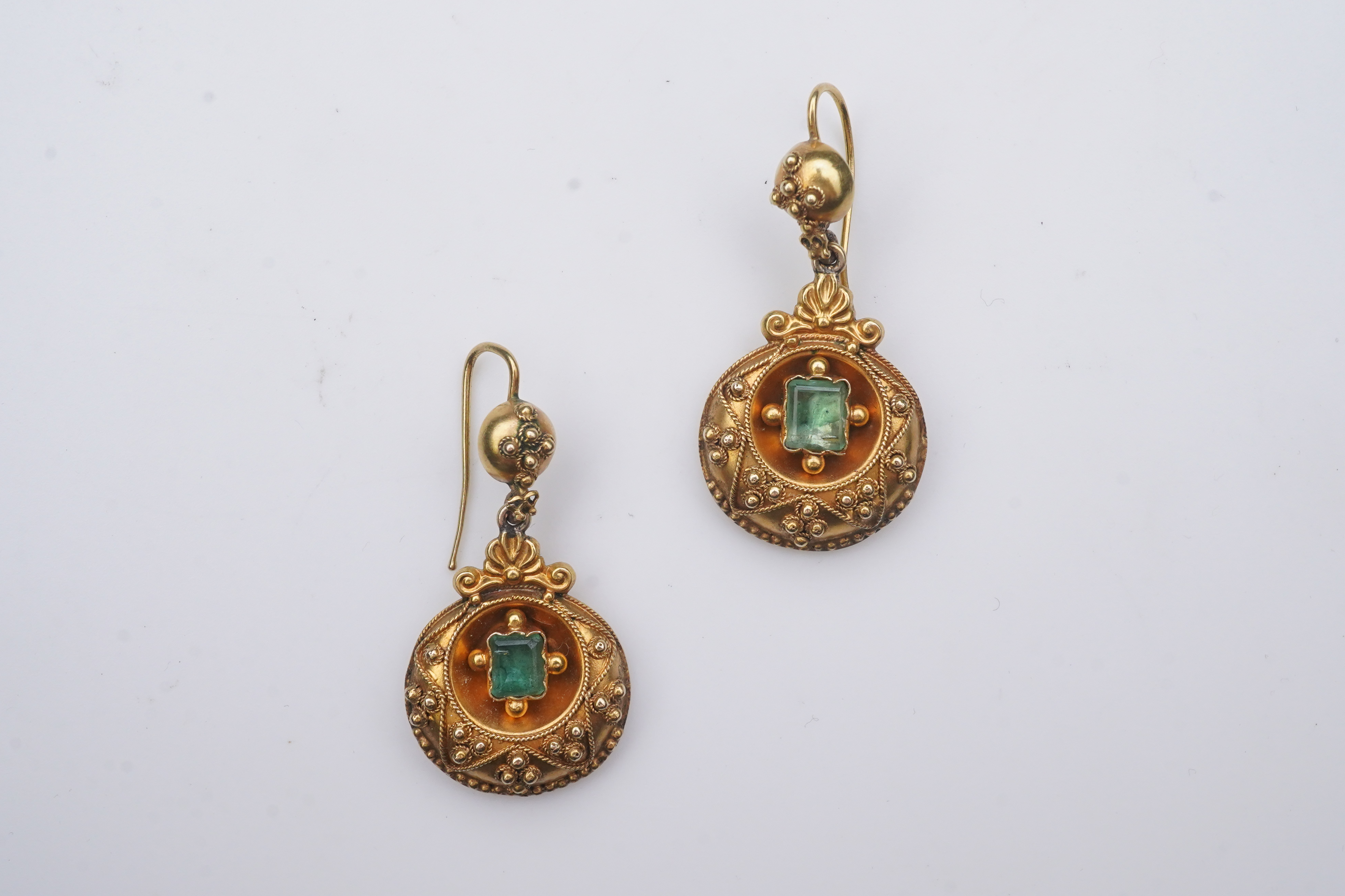 A pair of Victorian emerald and gold earrings, third quarter 19th century